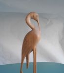 couple d'oiseau sculptés en bois clair