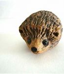 Petit hérisson en terre cuite