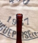 Jolie bouteille en verre ambré 