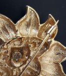 Broche tournesol vintage en métal doré 