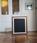 Grand miroir en XX ème siècle résine noire et dorée 