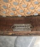 Fauteuil Baumann bois et cannage