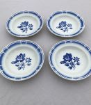 Série de 4 assiettes - en porcelaine