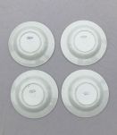 Série de 4 assiettes - en porcelaine