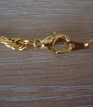 Collier torsadé en métal doré