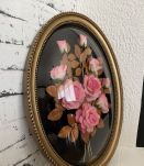 Cadre avec fleurs sous verre