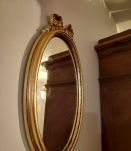 Miroir médaillon doré style Louis XVI