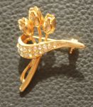 Broche plaquée  or et tourmaline Pommier