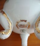 Vase oeuf tripode en porcelaine d'art  