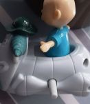 Figurine Casse bonbon dans son porteur 