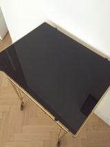 Desserte vintage dorée et plateau de verre noir