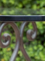 Grande table ovale de jardin avec plateau de verre