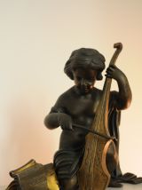 Pendule en marbre blanc, petit ange jouant de la musique