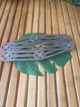 dessous de plat en métal accordéon