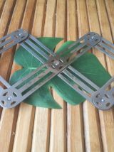 dessous de plat en métal accordéon