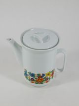 Théière en porcelaine vintage