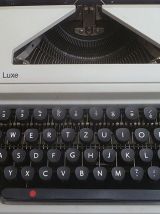 Machine à écrire Olympia AEG Régina de Luxe + valise  