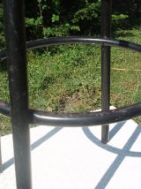 Suite de 4 tabourets de bar en bois coloré et métal noir