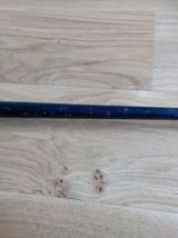 Tabouret en métal et skaï noir à pieds fuselés