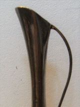 Aiguière en orfèvrerie argentée vase