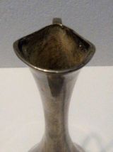 Aiguière en orfèvrerie argentée vase