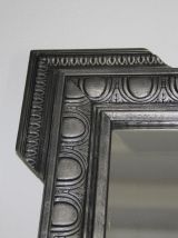Miroir ancien en bois sculpté, patiné noir et argent