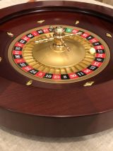 Roulette en acajou et son tapis