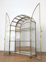 Vitrine vintage en verre , laiton et fond miroir