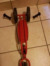 trotinette pliable 3 roues de marque Nordy rouge et blanche