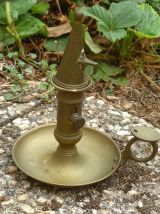 Bougeoir a  poussoir vintage en laiton  avec son éteignoir