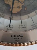 pendule Seïko mappemonde avec axe pivotant des années 80
