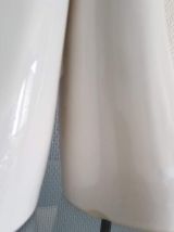 grande lampe mains céramique avec globe bleu en polymère 