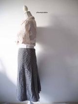 Jupe midi plissée en laine motifs pied de poule vintage 70's