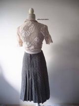 Jupe midi plissée en laine motifs pied de poule vintage 70's