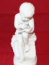 BISCUIT AMOUR LISANT D'APRÈS CANOVA.