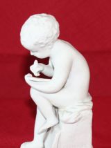 BISCUIT AMOUR LISANT D'APRÈS CANOVA.