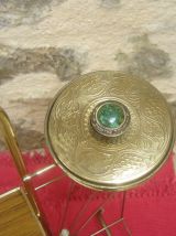 Porte revue en métal doré et cendrier