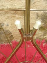 Porte revue en métal doré et cendrier