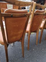  superbe chaise vintage en skaï marron liseré blanc