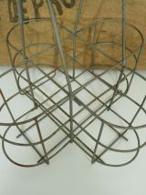 Ancien porte bouteilles en métal poignée plastique. 