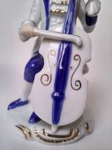 statuette figurine de porcelaine musicien