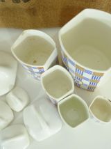 Série de 5 pots à épices en faïence, estampillé Yvonne