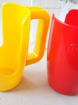 Deux porte verres et leurs verres marque Esso 