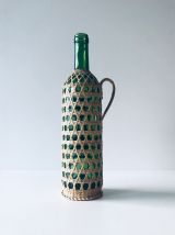 Bouteille décorative avec osier