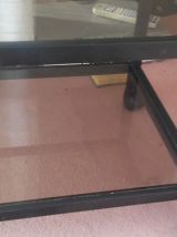 Meuble TV en verre sur roulettes