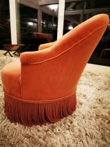 Fauteuil crapaud restauré en velours rose 