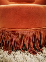 Fauteuil crapaud restauré en velours rose 