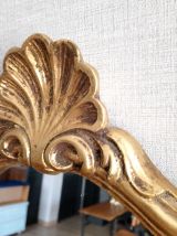 Miroir rocaille doré à la feuille d'or. 