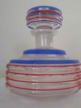 Carafe aux cercles rouges et bleus