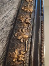 miroir ancien Louis Philippe en bois noir et doré